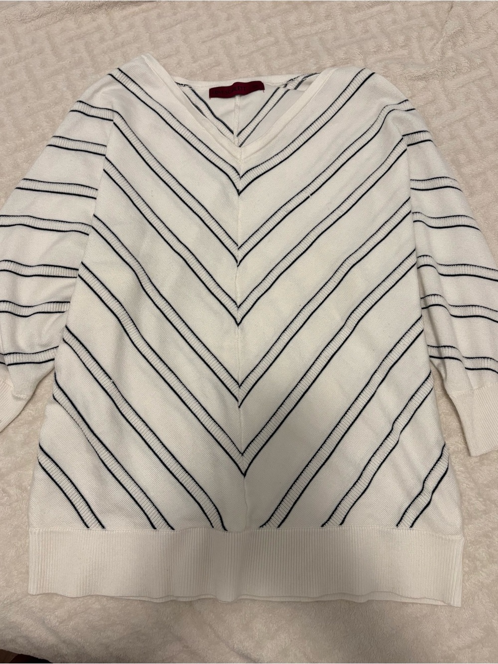 white v-neck striped sweater